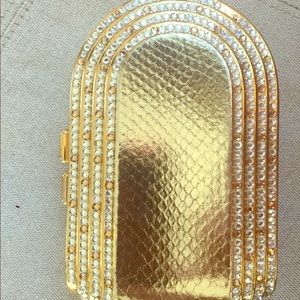 Gold Metal clutch with diamond trim front and Back